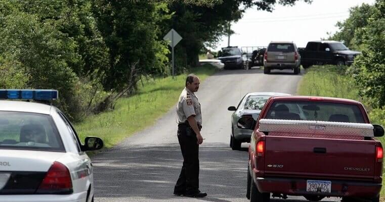 photo showing vehicles stopped by police 