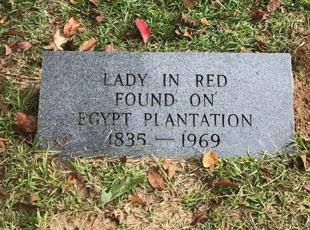 grave marker reading: Lady in Red Found on Egypt Plantation