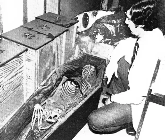 Newspaper photo of skeleton found in closet in Odd Fellows Lodge